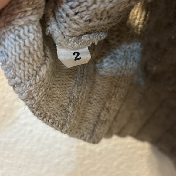 No brand or size sweater tank fits like a XXS - Picture 3 of 3